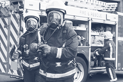 Two firefighters with hose